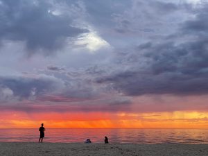 Sunset at Glenelg Beach with beautiful deep colors, fire-orange sky