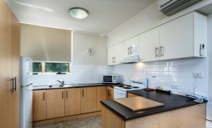 Photo of the kitchen of Corfu Apartments in Glenelg