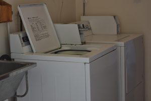 Photos of the washing machines in Corfu Apartments in Glenelg